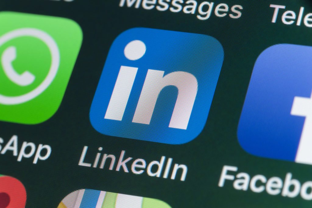 LinkedIn, Facebook, Snapchat and other phone Apps on iPhone screen